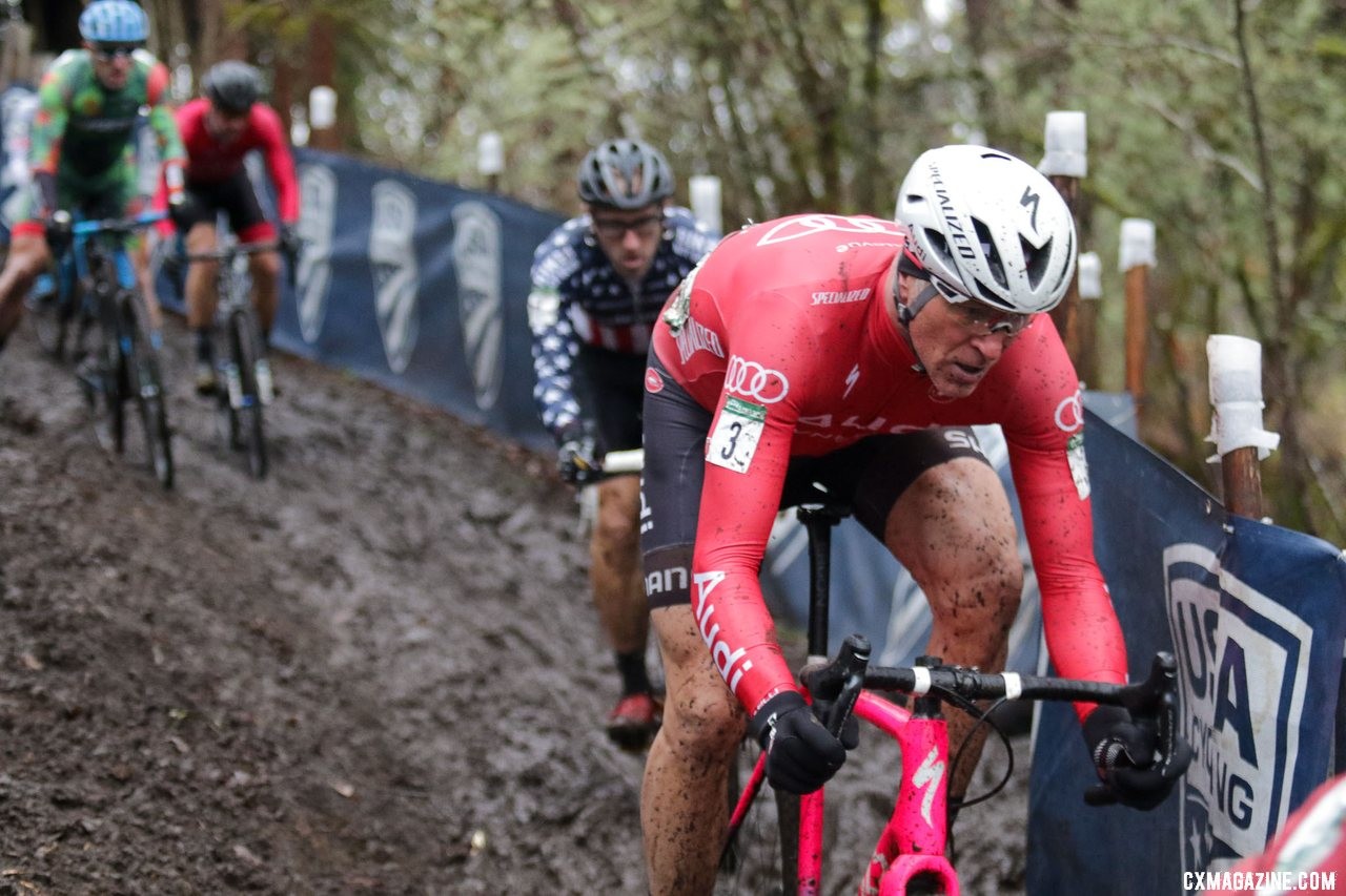 Ian Tubbs leads the defending national champ down the greasy chicane. Masters Men 45-49. 2019 Cyclocross National Championships, Lakewood, WA. © D. Mable / Cyclocross Magazine
