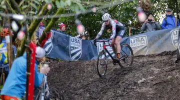 Melissa Barker slides under the disco lights on a slippery descent. Masters Women 45-49. 2019 Cyclocross National Championships, Lakewood, WA. © D. Mable / Cyclocross Magazine