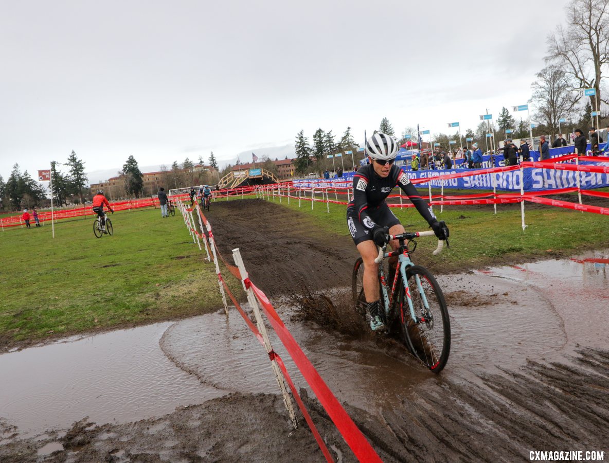 Tracy Yates blasts through a puddle early in the race. Masters Women 50-54. 2019 Cyclocross National Championships, Lakewood, WA. © D. Mable / Cyclocross Magazine