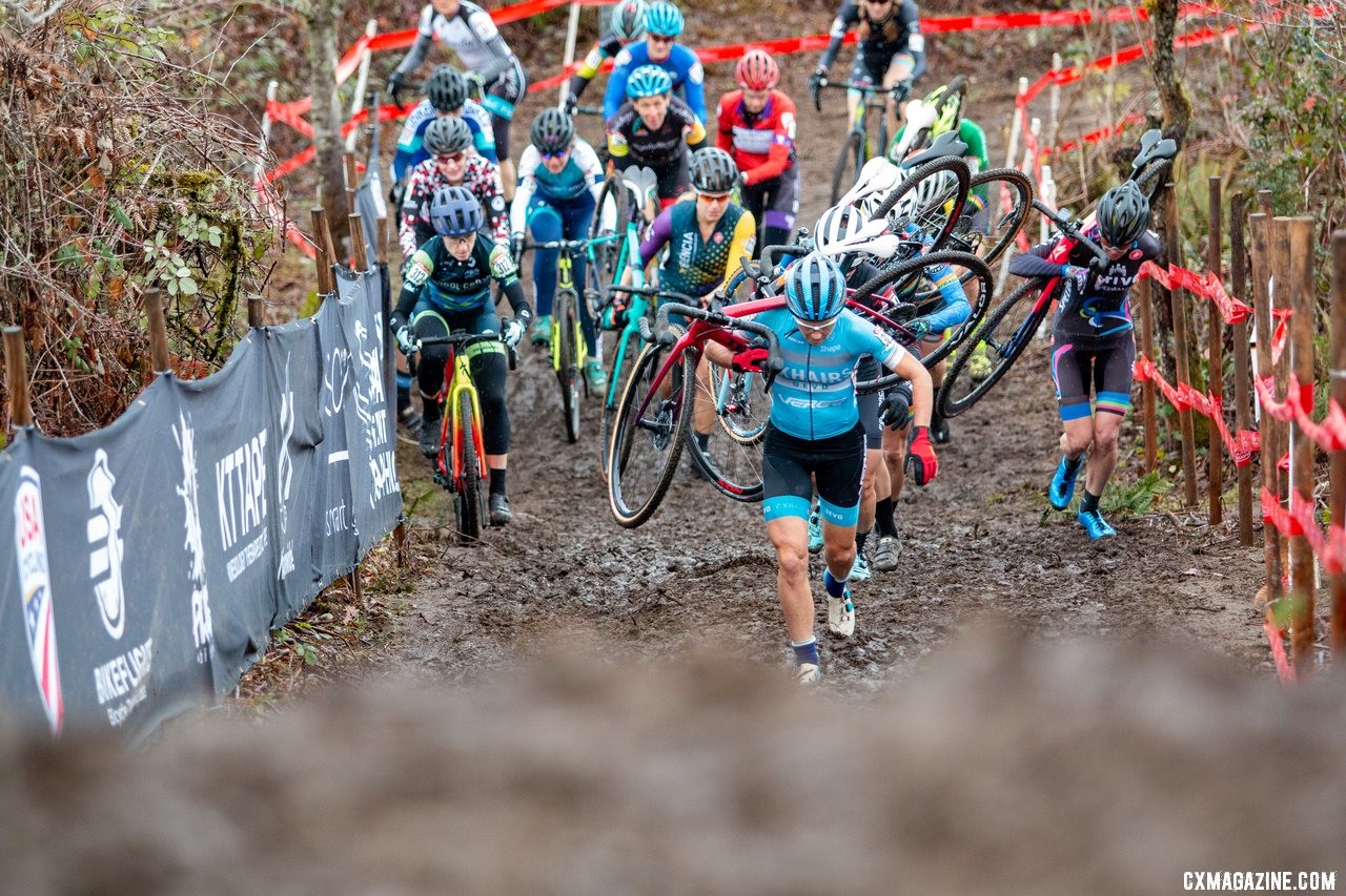 With the entire field in her wake, Elizabeth Sheldon leads up the first climb. The Masters Women 50-54 hit the run-up for the first time. 2019 Cyclocross National Championships, Lakewood, WA. © A. Yee / Cyclocross Magazine