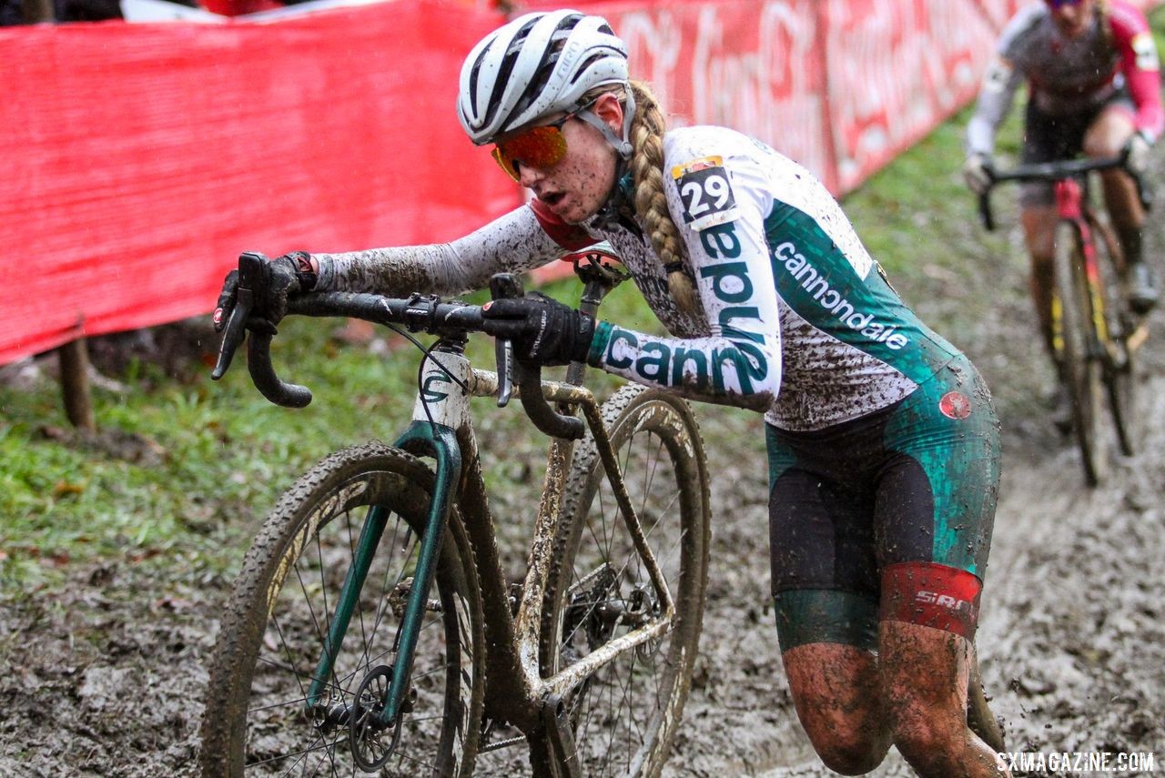 Katie Clouse pushes her bike at the end of the off-camber. 2019 World Cup Namur. © B. Hazen / Cyclocross Magazine