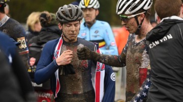 U.S. riders share a fist bump after their race. U23 Men, 2019 Namur UCI Cyclocross World Cup. © B. Hazen / Cyclocross Magazine