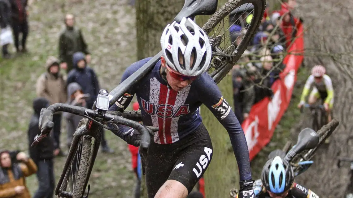 Madigan Munro heads upward and forward up the steep run-up. 2019 World Cup Namur. © B. Hazen / Cyclocross Magazine