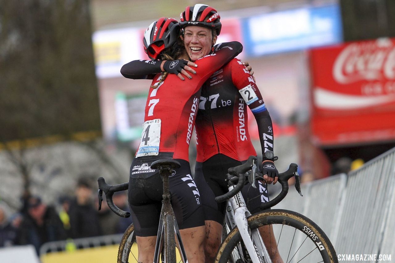 Alice Maria Arzuffi congratulates teammate Annemarie Worst on the Dutch rider's win. 2019 Superprestige Zonhoven. © B. Hazen / Cyclocross Magazine