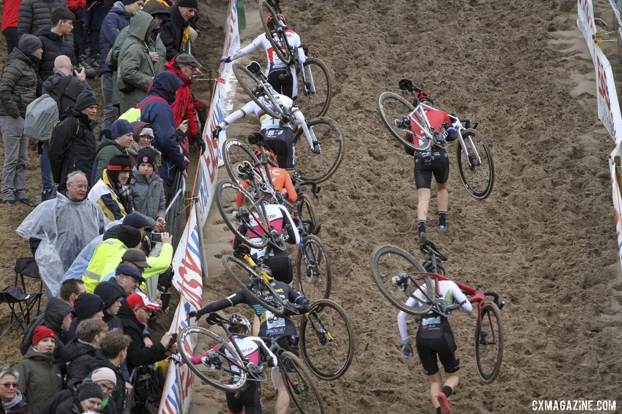 The Elite Women scramble up the De Kuil wall in the first lap. 2019 Superprestige Zonhoven. © B. Hazen / Cyclocross Magazine