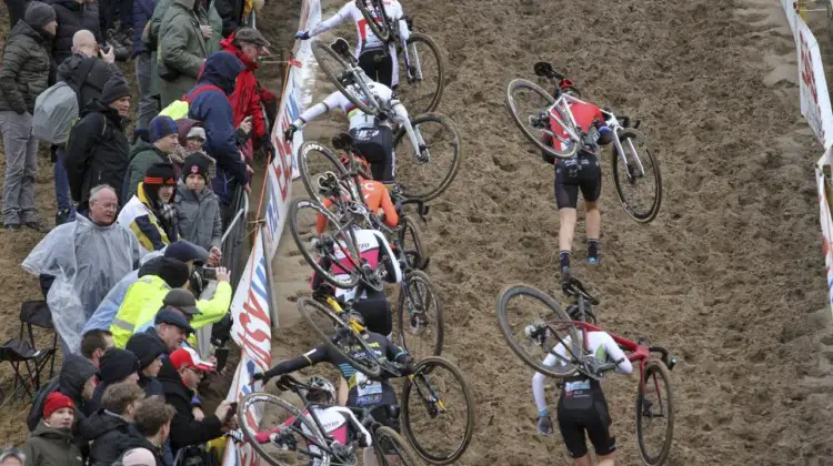 The Elite Women scramble up the De Kuil wall in the first lap. 2019 Superprestige Zonhoven. © B. Hazen / Cyclocross Magazine