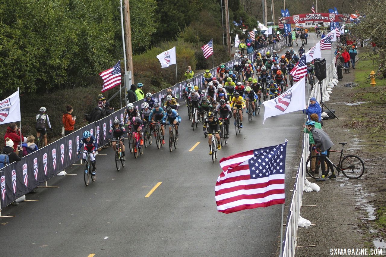 The Masters Men 55-59 riders charge down the start straight. © Cyclocross Magazine