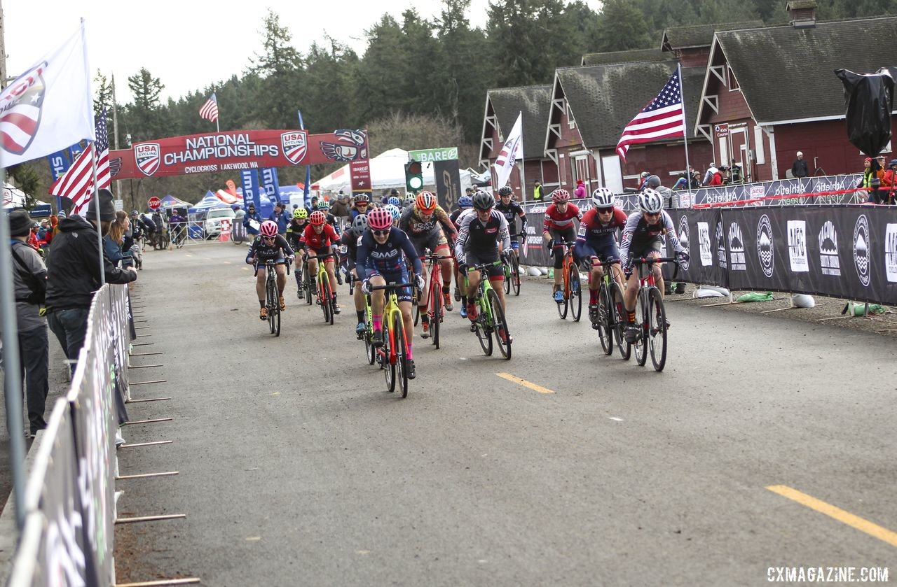 The Masters Women 45-49 field races down the holeshot straight. © Cyclocross Magazine