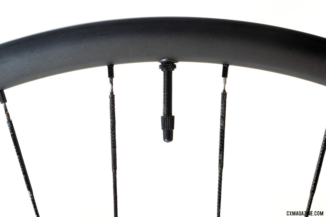 The Atomik XC33 rim is 24mm deep. Atomik's Ultimate Berd carbon tubeless wheels with Berd polyethylene spokes. © Cyclocross Magazine