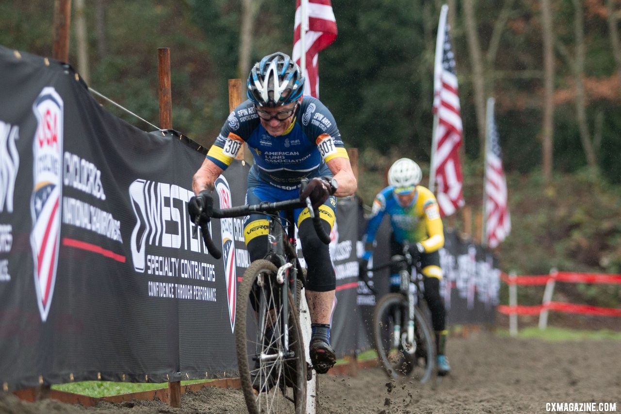 Smith bobbled on the second-to-last lap through the sand, and it looked like the race was over but he rejoined Curley by the pavement. Masters Men 65-69. 2019 Cyclocross National Championships, Lakewood, WA. © A. Yee / Cyclocross Magazine