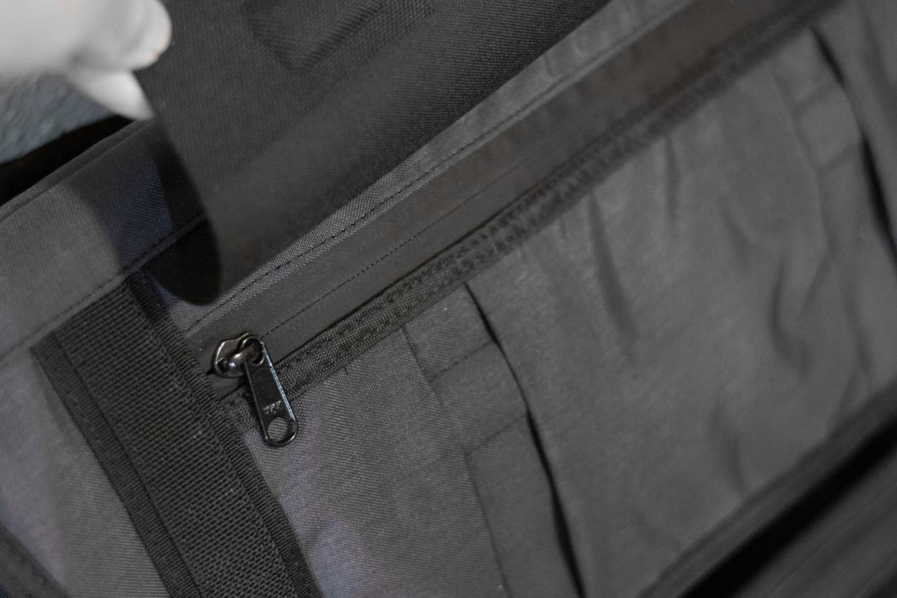 The Mission Workshop Khyte laptop messenger bag has lots of small pockets and organizing opportunities. The pocket is covered by a magnetic rain flap. © Cyclocross Magazine