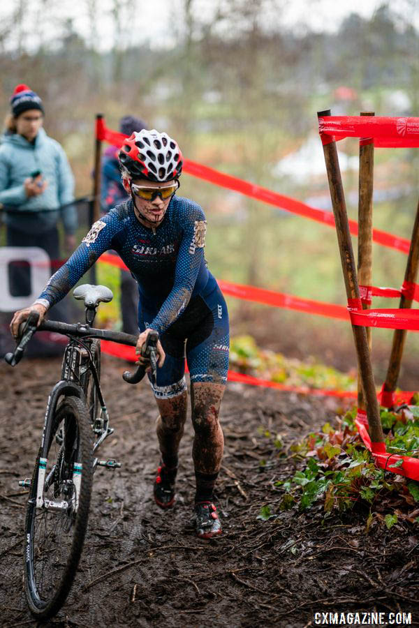 One of four Colorodans in the top five of the Junior Women's race on Sunday, Cassie Hickey is shown here shrugging off a little blood and mud. 2019 Lakewood U.S. Cyclocross Nationals. © Drew Coleman