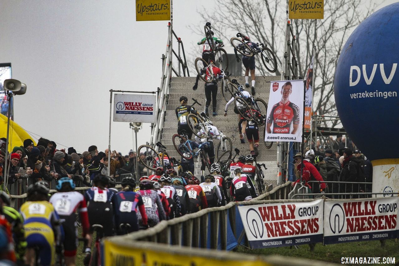 The Elite Women's field heads up and over the flyover in the first lap. 2020 GP Sven Nys, Baal. © B. Hazen / Cyclocross Magazine
