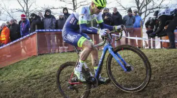 Quinten Hermans and his cube power up one of the slick hills. 2020 World Cup Nommay, France. © B. Hazen / Cyclocross Magazine