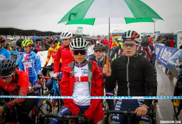 Riberolle shared an umbrella, and shared the podium. U23 Women, 2020 UCI Cyclocross World Championships, Dübendorf, Switzerland. © B. Hazen / Cyclocross Magazine