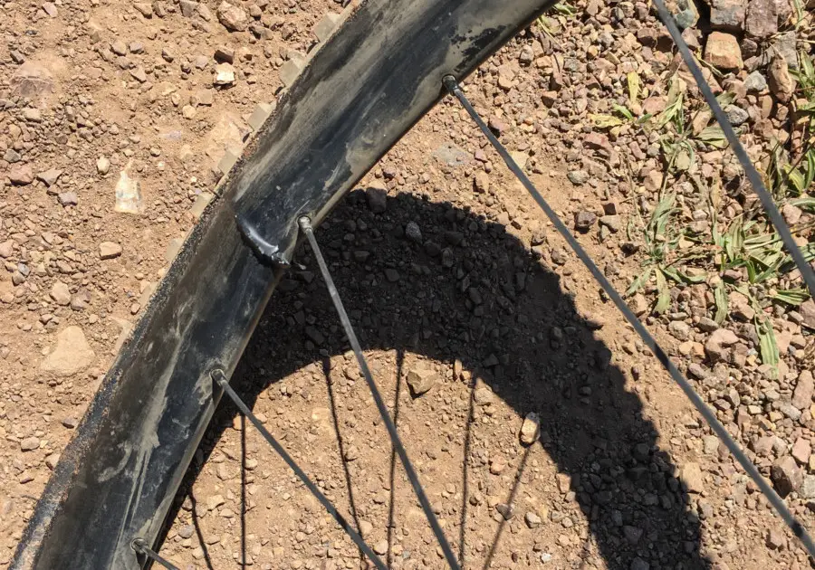 This carbon rim with similar dimensions to the WTB CZR i23 was the victim of a high speed (30 mph) rock strike. The rim is 30 mm external width with a 40cm tire mounted run at 23 psi. If this was a WTB CZR i23, it'd be covered by the Ride With Confidence Guarantee. © C.Lee/Cyclocross Magazine