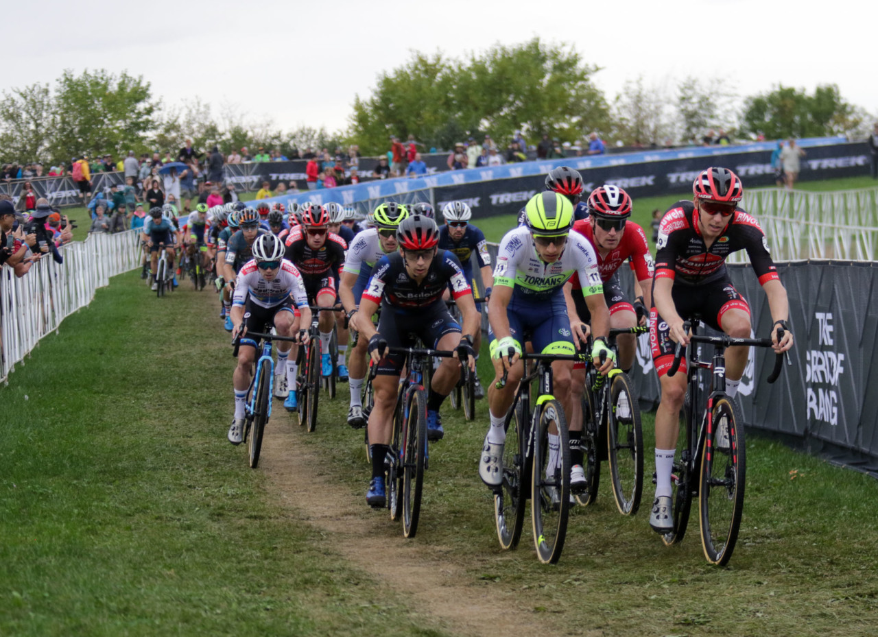 Quinten Hermans and Michael Vanthourenhout had fast starts and led the first lap before the rain took down Hermans. 2021 UCI Cyclocross World Cup Waterloo, Elite Men. © D. Mable / Cyclocross Magazine