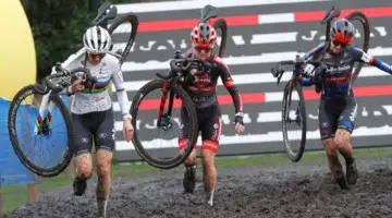 Lucinda Brand and Denise Betsema sprinted through the mud. 2021 X2O Trofee Azencross Loehout Elite Women. © B. Hazen / Cyclocross Magazine