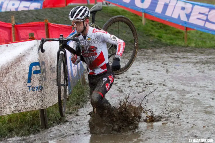 World Cup leader Eli Iserbyt. Deep puddles and heavy mud featured today. 2021 Zolder UCI Cyclocross World Cup, Elite Men. © B. Hazen / Cyclocross Magazine
