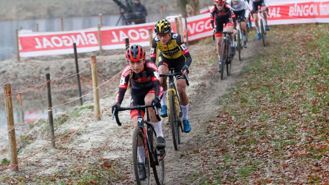 Denise Betsema passes Marianne Vos. 2021 Rucphen UCI Cyclocross World Cup, Elite Women. © B. Hazen / Cyclocross Magazine