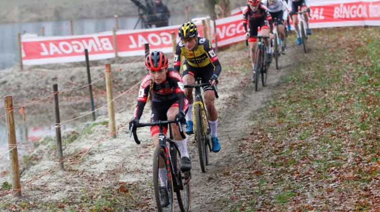 Denise Betsema passes Marianne Vos. 2021 Rucphen UCI Cyclocross World Cup, Elite Women. © B. Hazen / Cyclocross Magazine