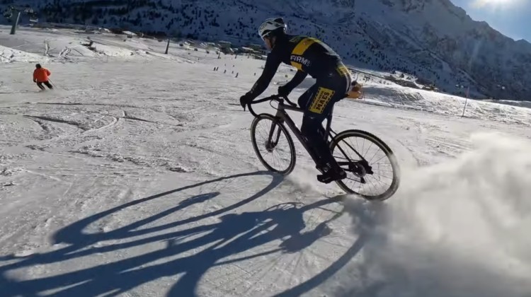 Daan Soete chases skiers at Val di Sole
