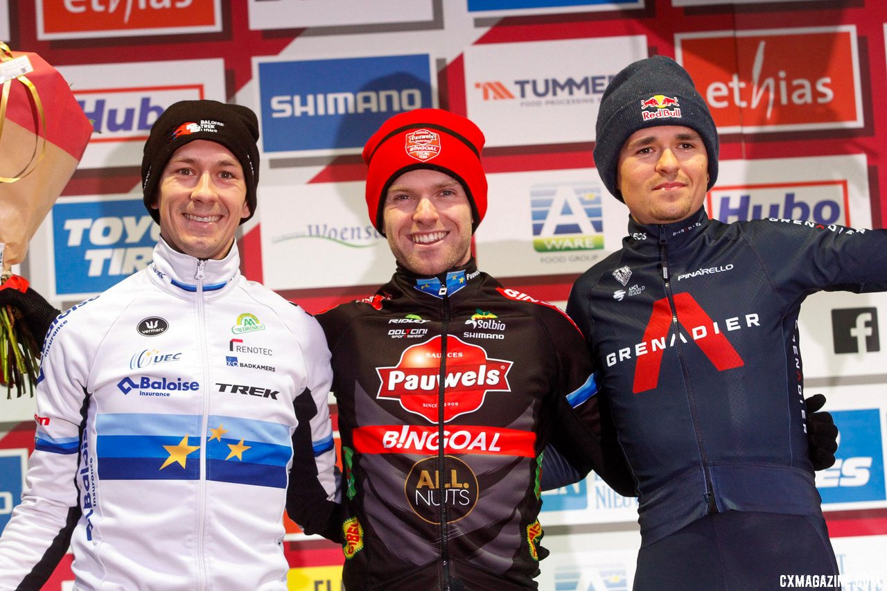 Eli Iserbyt, Lars van der Haar, and Tom Pidcock on the podium. 2022 Hoogerheide UCI Cyclocross World Cup, Elite Men. © B. Hazen / Cyclocross Magazine