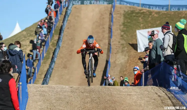 Puck Pietrse absorbs the bump warming up for the U23 Women's 2022 World Championship. 2022 Cyclocross World Championships, Fayetteville, Arkansas USA. © J. Corcoran / Cyclocross Magazine