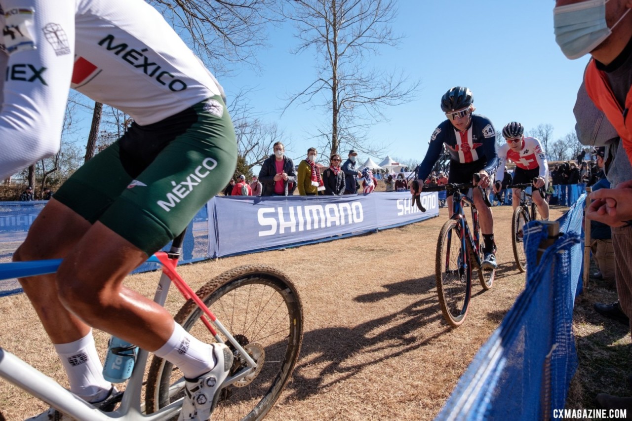 Daxton Mock folllows Mexico's Isaac Del Toro Romero. U23 Men, 2022 Cyclocross World Championships, Fayetteville, Arkansas USA. © G. Gould / Cyclocross Magazine
