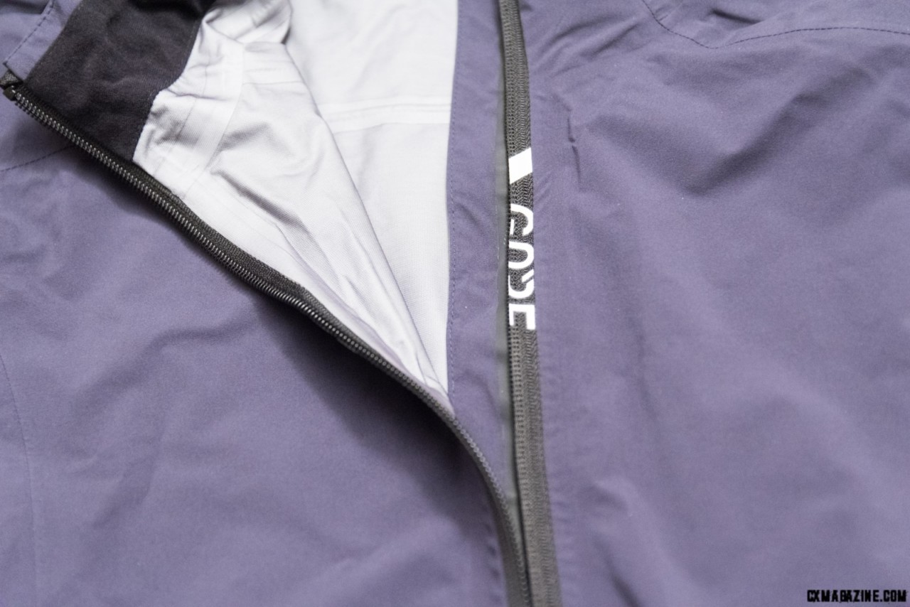 Gore Wear Torrent Jacket uses a reversed one way coil zipper with a rain flap. © C.Lee/ Cyclocross Magazine