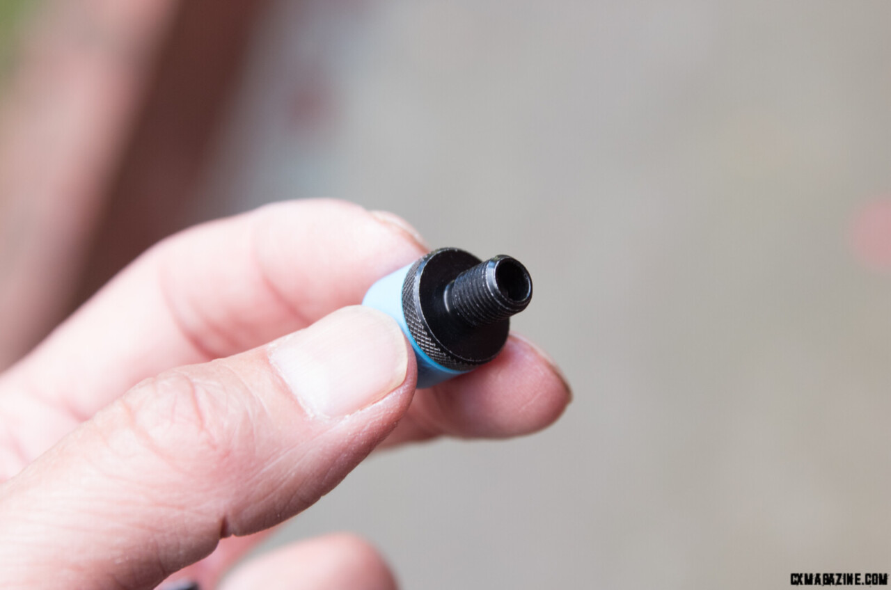 The threads on the backside of the air chuck head are the same as a Shrader valve, so you can use it as an adaptor
