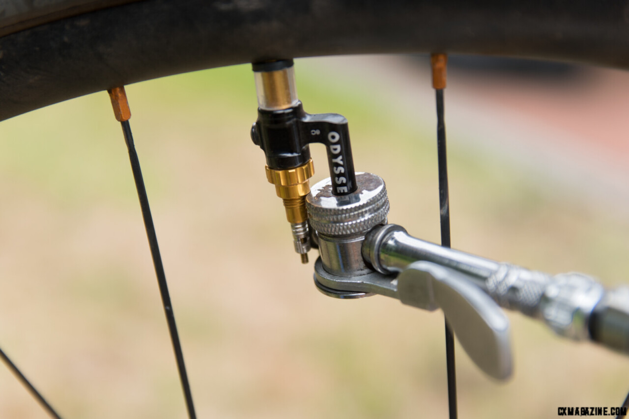 Proximity of the two valve stems creates some interference with a valve chuck. This one does work.