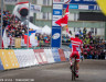 simon-andreassen-had-time-to-grab-a-flag-wheelie-and-salute-the-fans-multiple-times-matthew-lasala-cyclocross-magazine